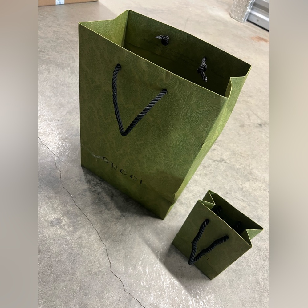 2 Gucci paper bags